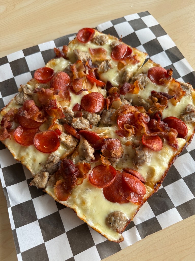 Detroit-style pan pizzas with crispy cheese edges