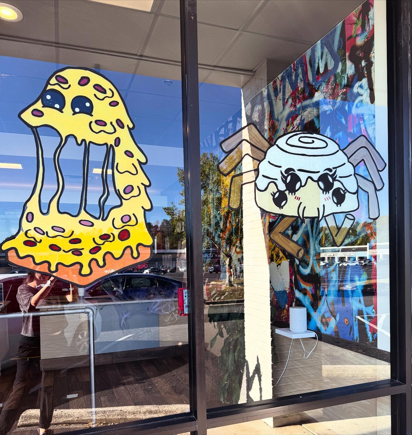 Storefront window art at Uncle G's