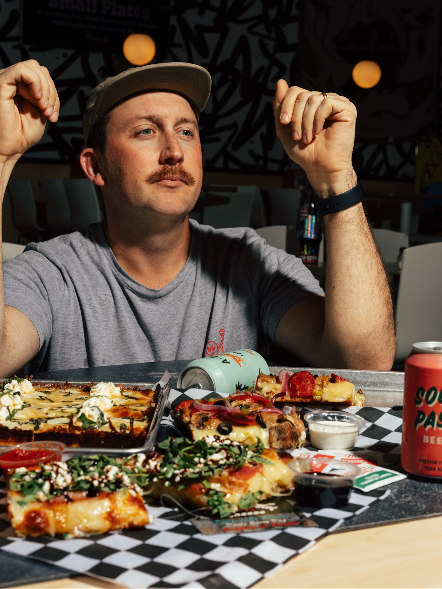 Uncle G at the shop with Detroit-style pizza